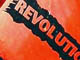 Революция. Флаг антиглобалистов. Фото: akm1917.org